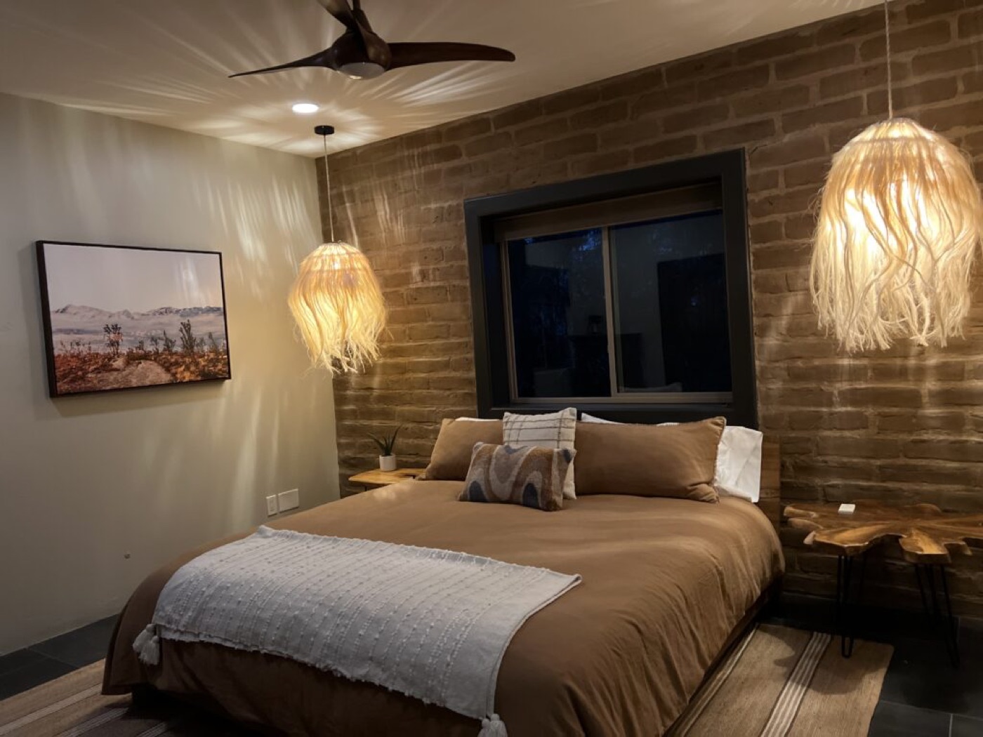 Scottsdale compound Tulum-style bedroom by Donna Brann Interiors