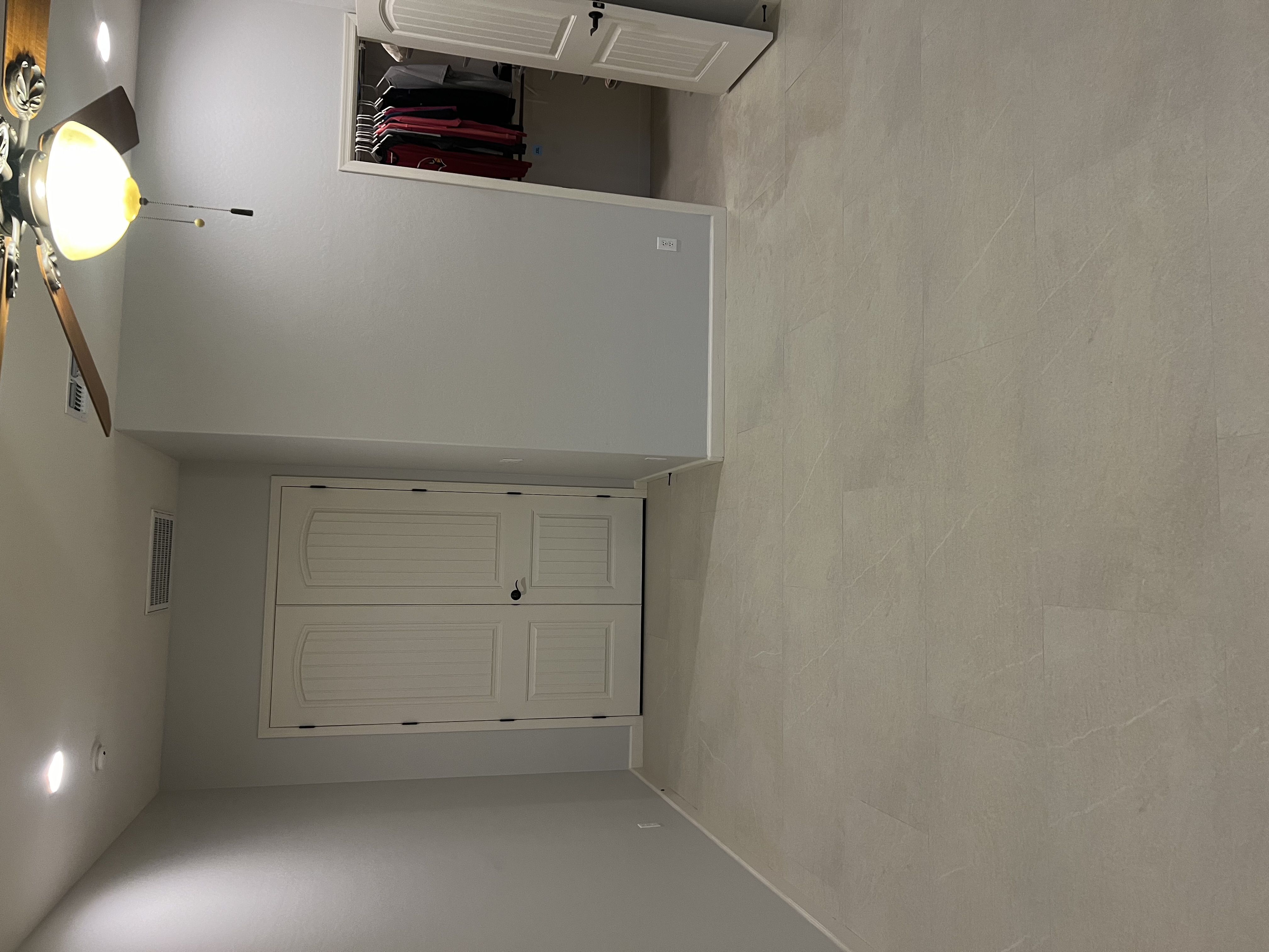 Large format cream tile flooring by Level Up Tile