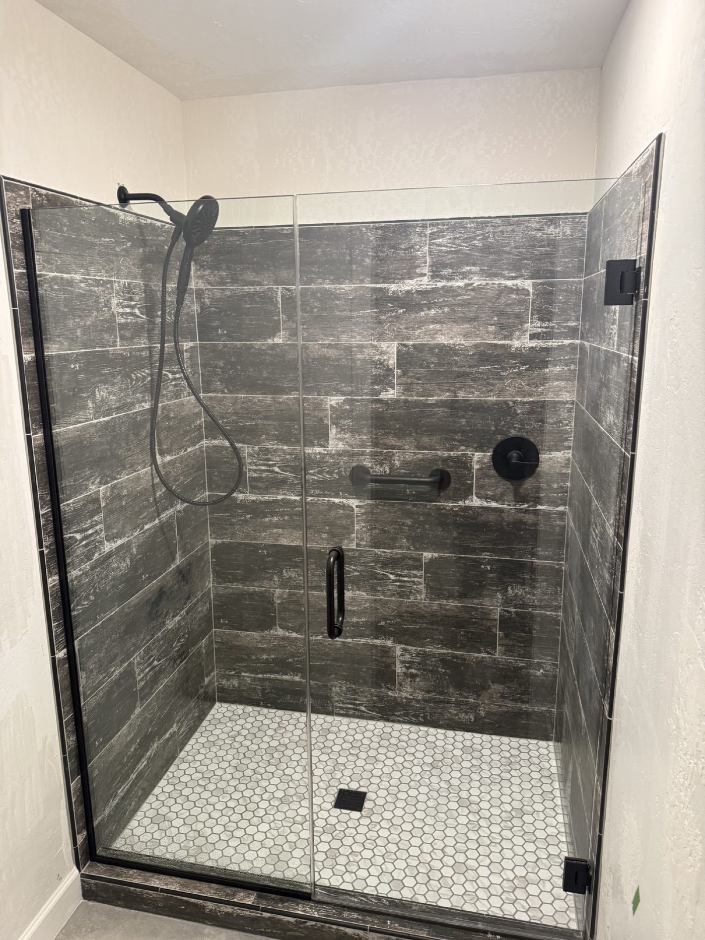 Semi-Frameless Glass Shower Enclosures by Level Up Tile in Peoria & Scottsdale AZ