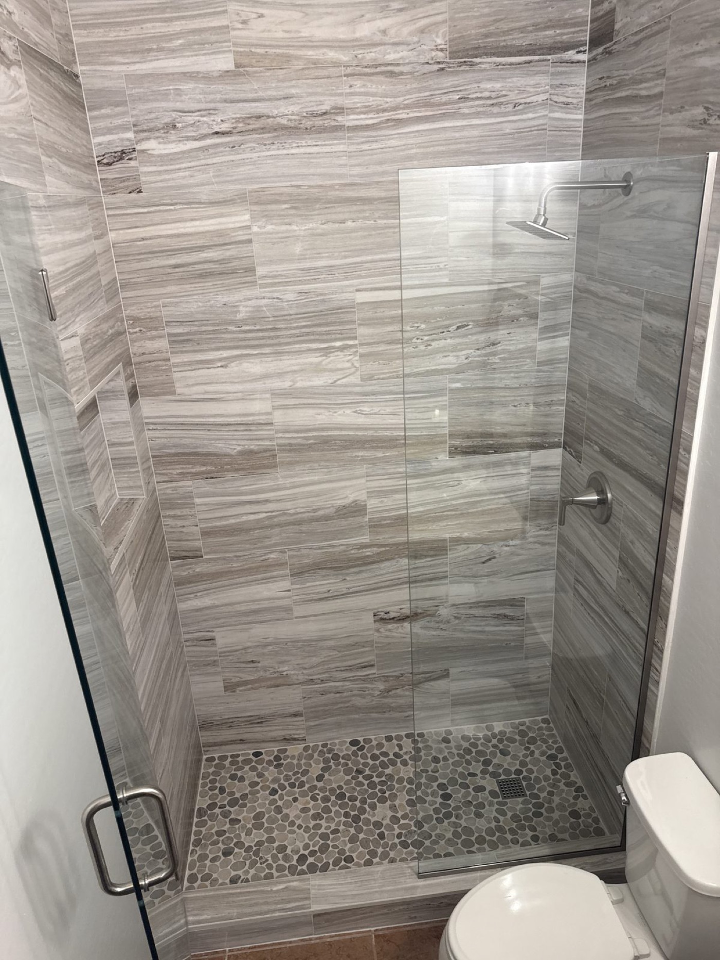 Semi-Frameless Glass Shower Enclosures by Level Up Tile in Peoria & Scottsdale AZ