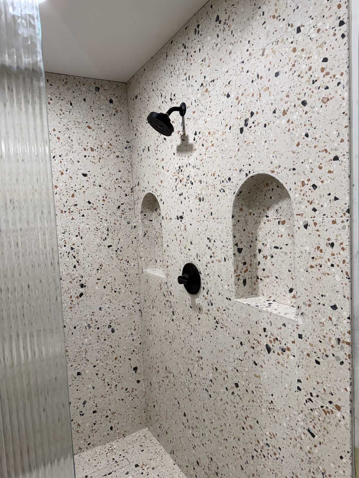 Custom walk-in shower installation with TCNA-standard waterproofing by Level Up Tile in Scottsdale AZ